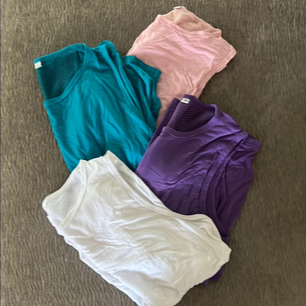 4 Sleeveless workout tops with Mesh Back